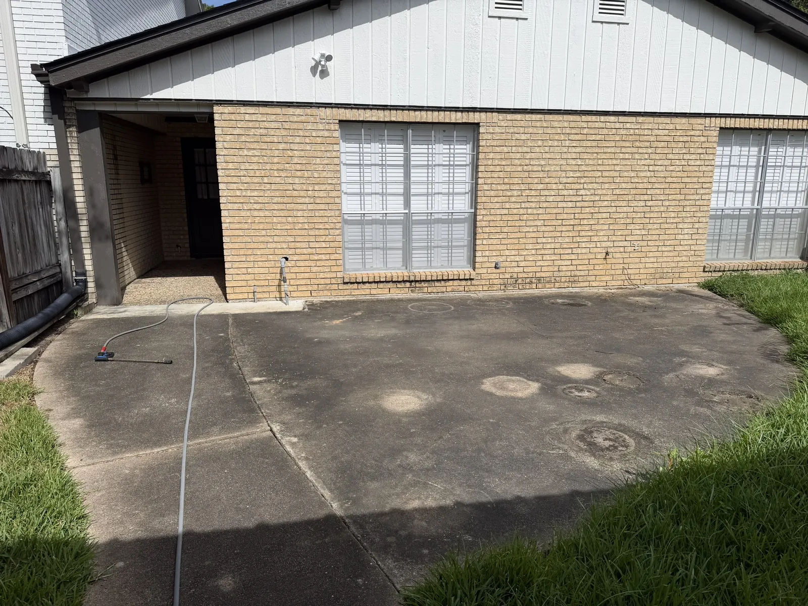 Stained concrete before pressure washing
