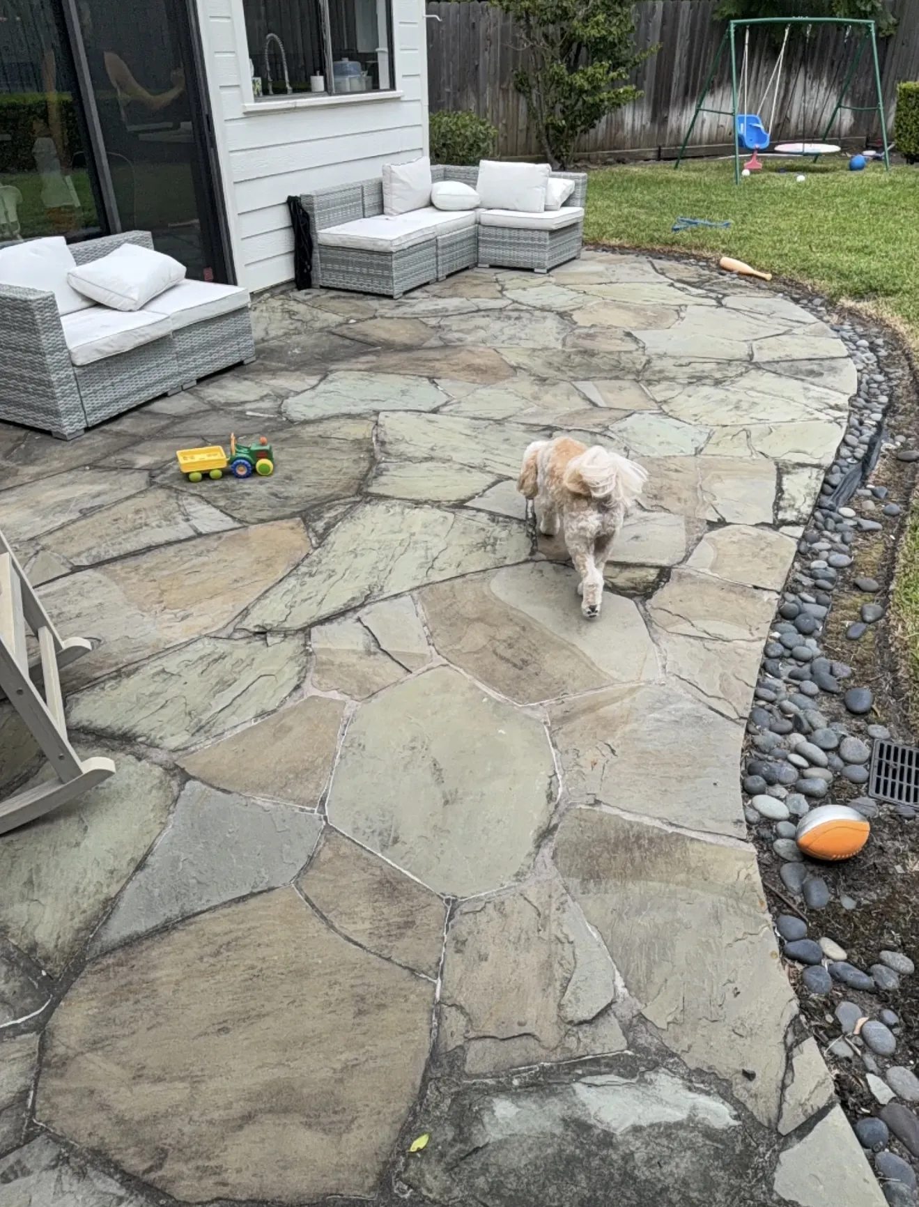 Flagstone patio in Houston before cleaning