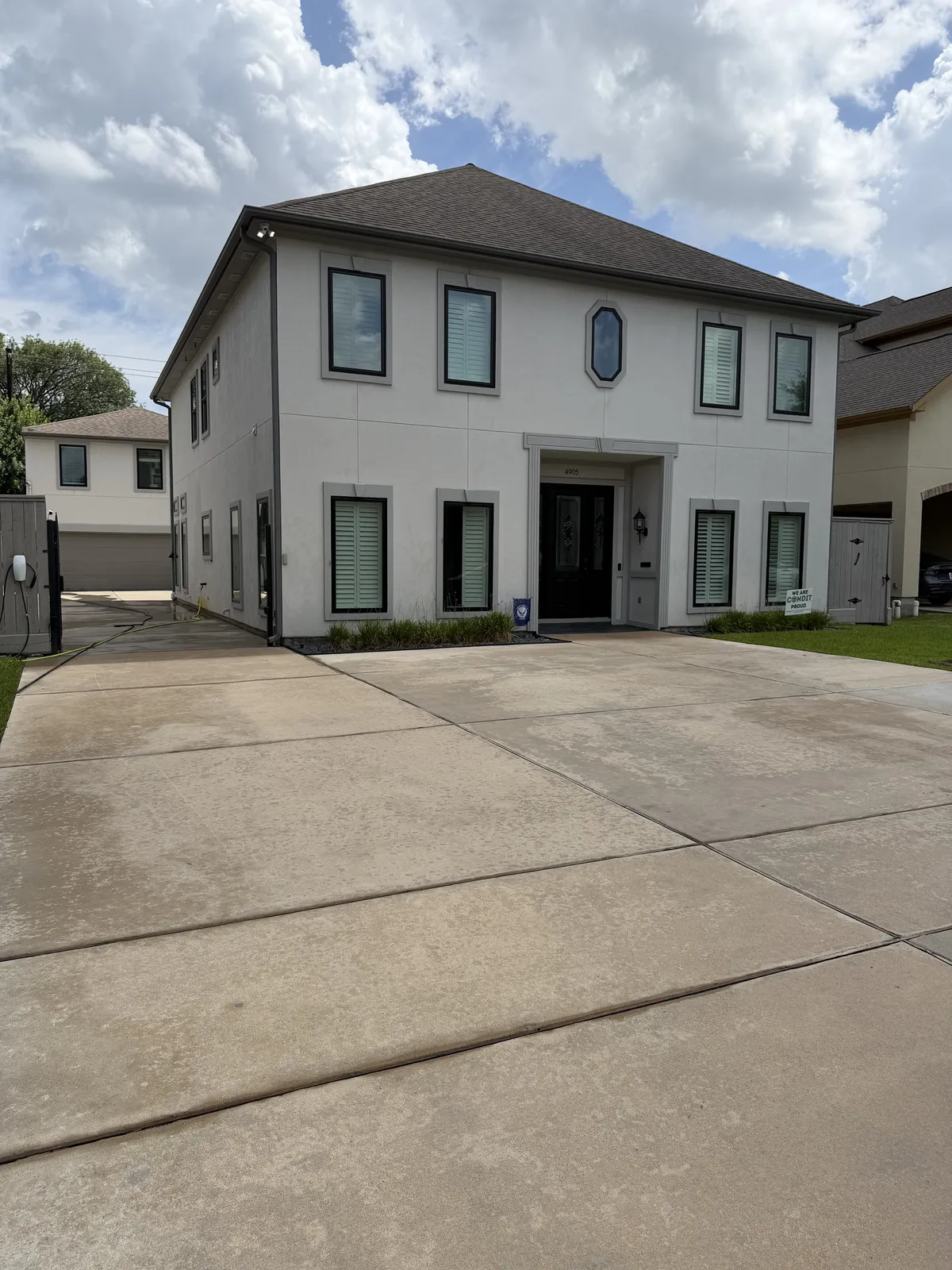 Clean two-story stucco home in Bellaire, TX