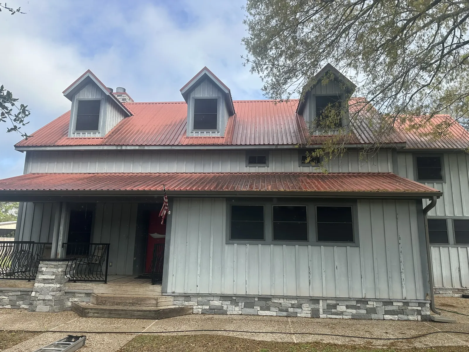 Stained metal roof before cleaning